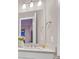 Bathroom with updated vanity and mirror at 65 Garibaldi Way, Henderson, NV 89011