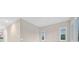 Bedroom with neutral walls, window shutters, and a ceiling fan at 65 Garibaldi Way, Henderson, NV 89011