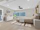 Spacious bedroom with large windows and modern furniture at 65 Garibaldi Way, Henderson, NV 89011