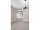 Open concept dining area with view into modern kitchen at 65 Garibaldi Way, Henderson, NV 89011