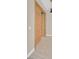 Elegant entryway with wood doors and modern light fixture at 65 Garibaldi Way, Henderson, NV 89011