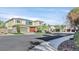 Two-story home with solar panels and a three-car garage at 65 Garibaldi Way, Henderson, NV 89011