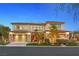 Beautiful two-story home with a three-car garage at 65 Garibaldi Way, Henderson, NV 89011