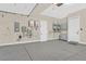 Finished garage with epoxy flooring and ample storage at 65 Garibaldi Way, Henderson, NV 89011