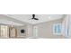 Bright living room featuring hardwood floors and a modern fireplace at 65 Garibaldi Way, Henderson, NV 89011