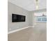 Living room with hardwood floors and a view into main bedroom at 65 Garibaldi Way, Henderson, NV 89011