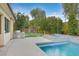 Outdoor kitchen and pool with spa, perfect for entertaining at 65 Garibaldi Way, Henderson, NV 89011