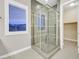 Spacious walk-in shower with glass enclosure at 65 Garibaldi Way, Henderson, NV 89011