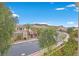 Scenic view of the community with mountains in the distance at 65 Garibaldi Way, Henderson, NV 89011