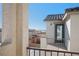 View from the balcony showcasing the neighborhood and exterior architecture at 7044 Stockton Dunes St, North Las Vegas, NV 89084