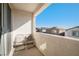 Balcony with seating to enjoy great views and sunny days at 7044 Stockton Dunes St, North Las Vegas, NV 89084