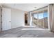 Spacious bedroom with private access to bathroom and balcony at 7044 Stockton Dunes St, North Las Vegas, NV 89084