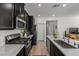 Modern kitchen with stainless steel appliances and an island at 7230 N Decatur Blvd # 6, Las Vegas, NV 89131
