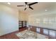 Bright bonus room featuring laminate flooring, a ceiling fan, and lots of natural light at 7481 Benlomond Ave, Las Vegas, NV 89179