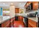 Modern kitchen with granite countertops and stainless steel appliances at 7481 Benlomond Ave, Las Vegas, NV 89179