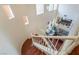 Open-concept living area with hardwood floors, high ceilings and multiple windows providing ample light at 7481 Benlomond Ave, Las Vegas, NV 89179