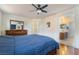 Spacious bedroom with walk through access to the ensuite bath, natural light and hardwood floors at 7481 Benlomond Ave, Las Vegas, NV 89179