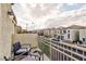 Relaxing balcony overlooking a quiet residential street at 7660 Fabled Filigree St, Las Vegas, NV 89149