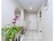 Bright entryway with mirror, console table, and plant at 7660 Fabled Filigree St, Las Vegas, NV 89149