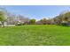 Large grassy park area with a covered picnic area at 7660 Fabled Filigree St, Las Vegas, NV 89149