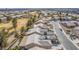 Aerial view of homes with mountain views at 7830 Lyrebird Dr, North Las Vegas, NV 89084