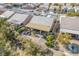 Aerial view of house with backyard patio, and outdoor kitchen at 7830 Lyrebird Dr, North Las Vegas, NV 89084