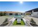 This backyard features a modern pool, integrated spa, and fire pit with mountain views at 82 Glade Hollow Dr, Las Vegas, NV 89135