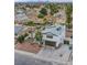 Two-story house with palm trees and distant city view at 881 Stonehenge St, Las Vegas, NV 89110