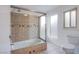 Clean bathroom with tile shower/tub combo and updated fixtures at 881 Stonehenge St, Las Vegas, NV 89110
