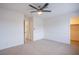 Bright bedroom with ceiling fan and spacious closet at 881 Stonehenge St, Las Vegas, NV 89110