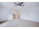 Large bedroom with ceiling fan and en-suite bathroom access at 881 Stonehenge St, Las Vegas, NV 89110