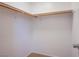 Spacious closet with wood shelving and hanging rods at 881 Stonehenge St, Las Vegas, NV 89110