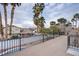 Deck overlooking backyard with pool and neighborhood views at 881 Stonehenge St, Las Vegas, NV 89110