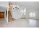 Bright and spacious entryway with high ceilings and elegant light fixture at 881 Stonehenge St, Las Vegas, NV 89110