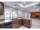 Kitchen with granite counters, pool view, and stainless steel appliances at 881 Stonehenge St, Las Vegas, NV 89110