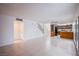 Open living area with kitchen and staircase views at 881 Stonehenge St, Las Vegas, NV 89110