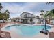 Relaxing kidney-shaped pool with attached spa at 881 Stonehenge St, Las Vegas, NV 89110