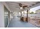 Covered patio with ceiling fan, overlooking the pool at 881 Stonehenge St, Las Vegas, NV 89110