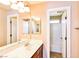 Bathroom with double vanity, mirror, and a separate shower and tub at 989 Crescent Falls St, Henderson, NV 89011