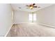 Spacious bedroom with carpeted floor and window with blinds at 989 Crescent Falls St, Henderson, NV 89011