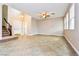 Spacious living room with tile floors and high ceilings at 989 Crescent Falls St, Henderson, NV 89011