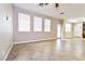 Bright living room with tile floors and access to backyard at 989 Crescent Falls St, Henderson, NV 89011