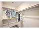 Spacious walk-in closet with hanging rods and shelves at 10164 Mulberry Ridge St # 42, Las Vegas, NV 89141