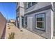 Small backyard with gravel and building exterior at 10168 Mulberry Ridge St # 43, Las Vegas, NV 89141