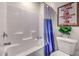 Clean bathroom with tub, shower, and decorative print at 10168 Mulberry Ridge St # 43, Las Vegas, NV 89141