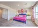 Spacious bedroom with king bed and ample closet space at 10168 Mulberry Ridge St # 43, Las Vegas, NV 89141