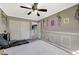 Well-lit bedroom with double doors leading to hallway at 10191 Cougar Crossing St, Las Vegas, NV 89178