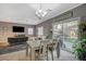 Dining area with sliding glass doors leading to backyard at 10191 Cougar Crossing St, Las Vegas, NV 89178