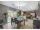 Kitchen features stainless steel appliances and wood cabinets at 10191 Cougar Crossing St, Las Vegas, NV 89178