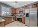 Modern kitchen featuring stainless steel appliances and granite countertops at 10191 Cougar Crossing St, Las Vegas, NV 89178